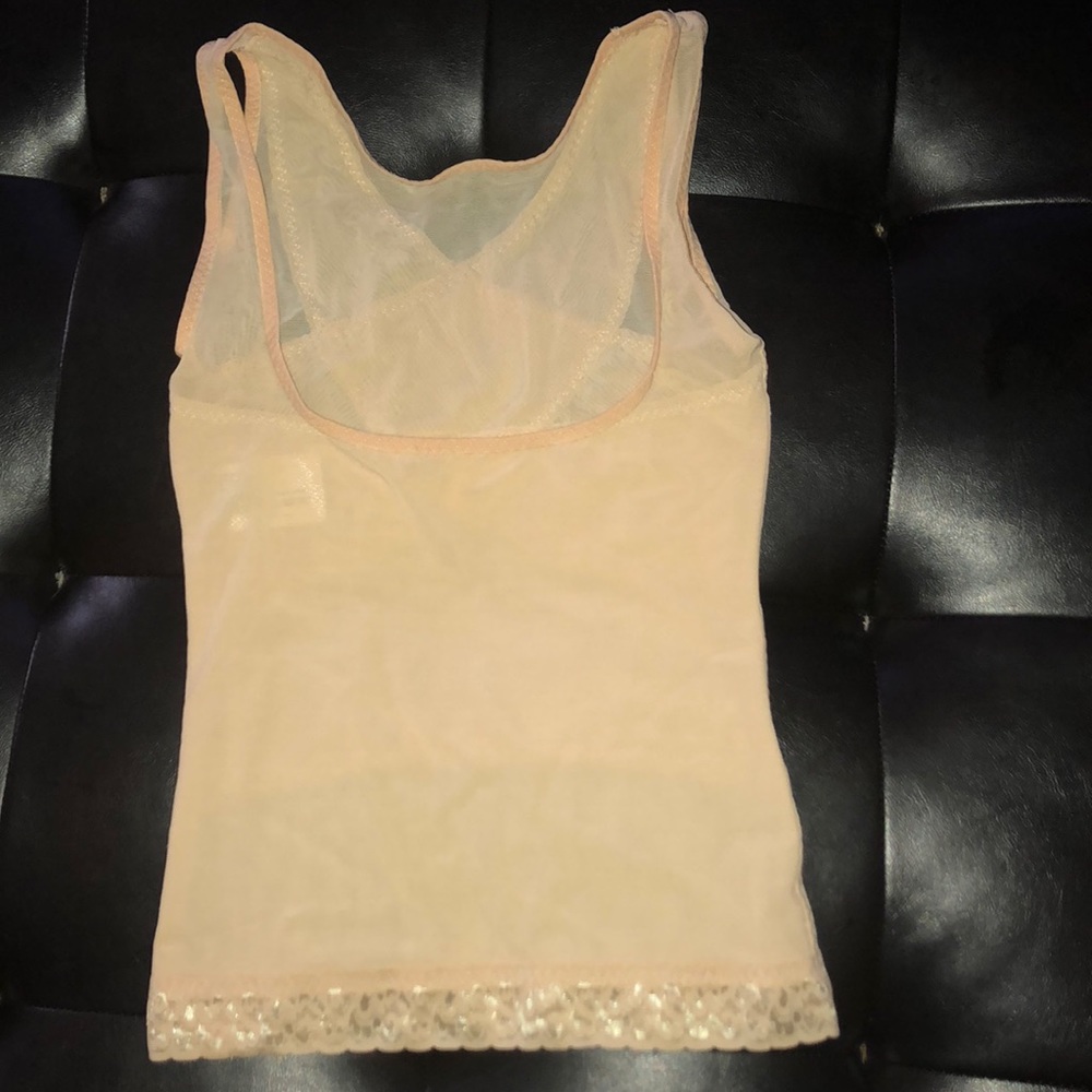 Garment gives firm abdominal and back support!